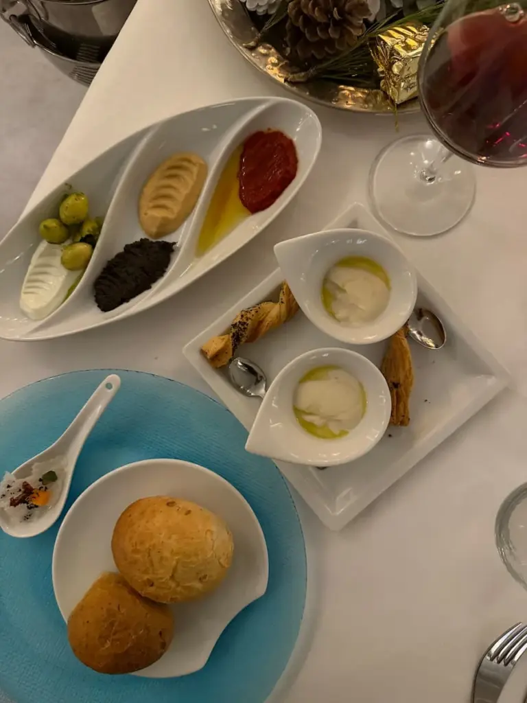 A medley of bread, harissa, olive and red pepper Starters at La Badira Restaurant, Hammamet, Tunisia